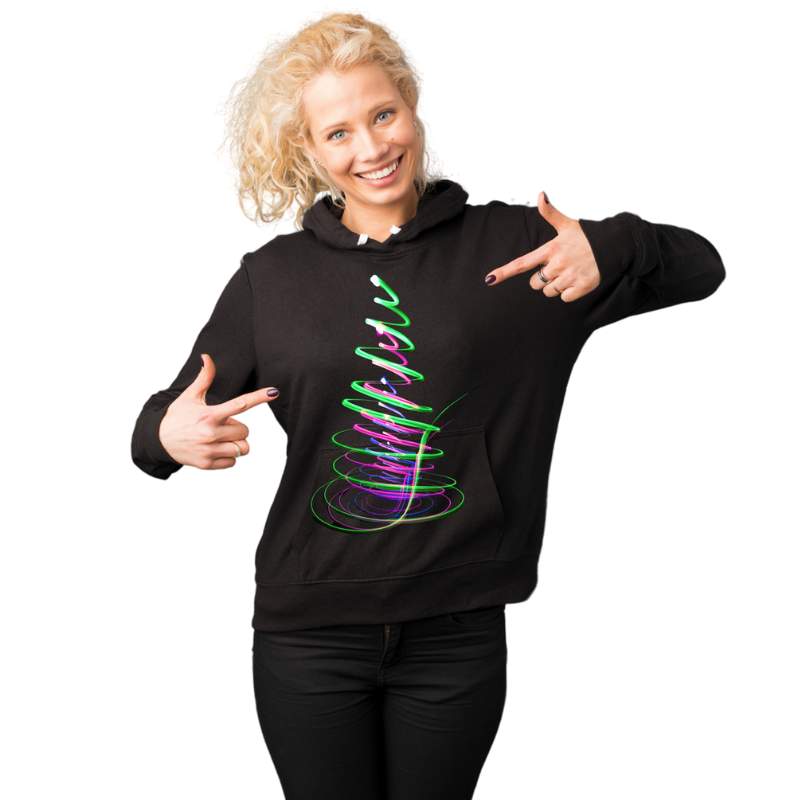 Person wearing a black hoodie with a colorful design, pointing to the hoodie.